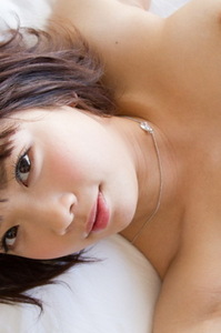 Cute Asian Girl Mana Sakura Gets Naked On A Bed 09